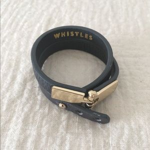 Whistles Navy Leather Bracelet with Gold Details.