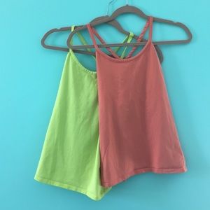 2 Victoria secret racetrack tanks