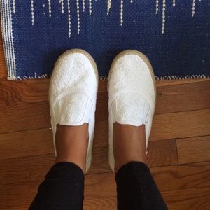 White slip ons. Canvas bottoms. Brand new