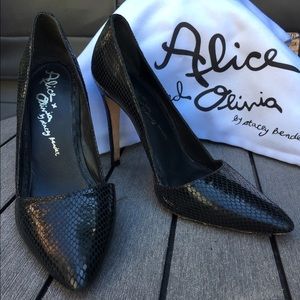 Black pointed toe pumps