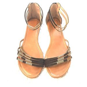 Black and gold sandals