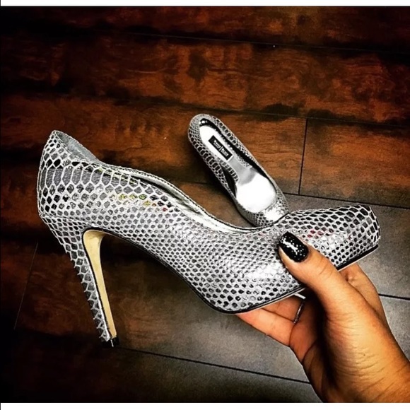 Silver snakeskin pumps