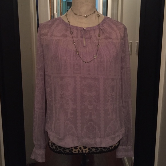 Jennifer Lopez silky blouse with camisole