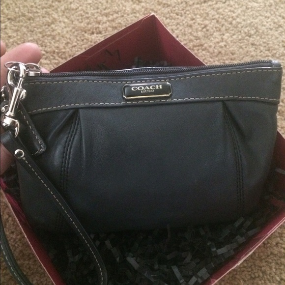 Dark blue Coach wristlet