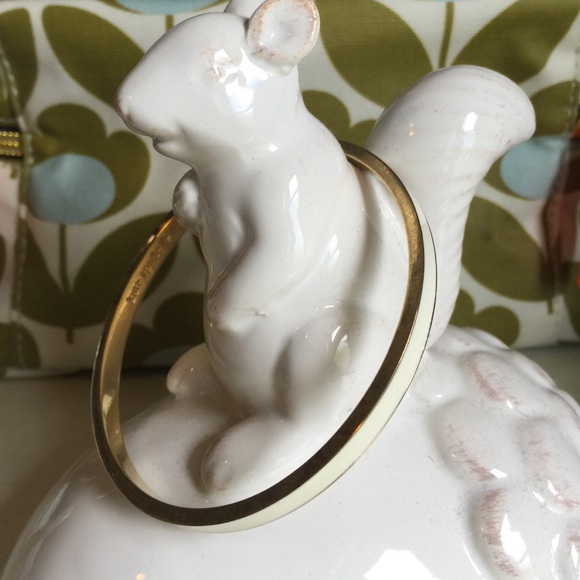 Kate Spade gold and white bangle