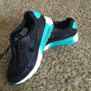Turquoise, white and black nike air maxes