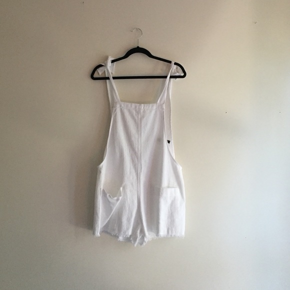 White knotted overalls