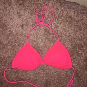 Bright pink bathing suit top