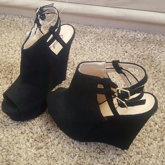 Peep toe wedges.