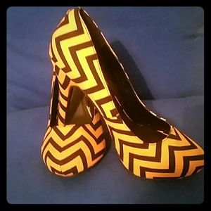 Yellow and black chevron heels