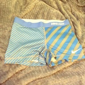 Blue and grey Nike Pros