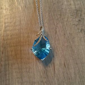 Blue Topaz and 1/6 CT Diamond Pendant