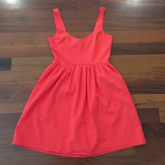 Red dress. Cinched waist. Very flattering