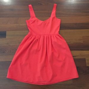 Red dress. Cinched waist. Very flattering