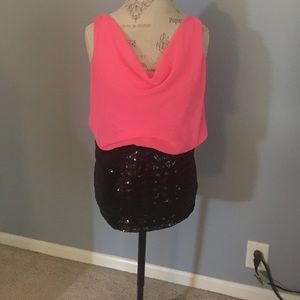 Bright pink and black sequin dress.