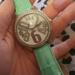 Pale turquoise Guess Diamond watch