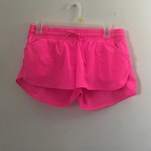 Fluorescent pink workout shorts
