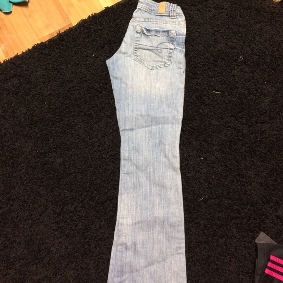 Slightly worn jeans a slight stretch longs