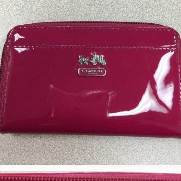 Two Coach wristlets.