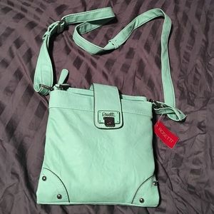Turquoise side bag brand new never used