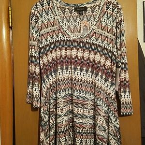 Pretty Karen Kane shark bite tunic.   SOLD