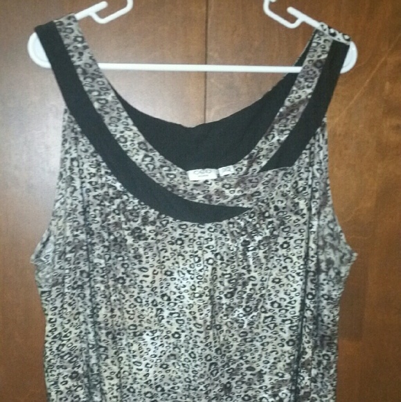 Sleeveless blouse.  Animal print.