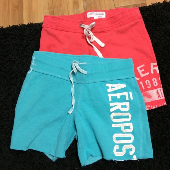 Bright orange and light green shorts nice comfy