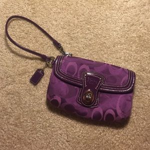 Purple coach wristlet