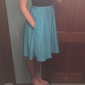 Knee length blue skirt