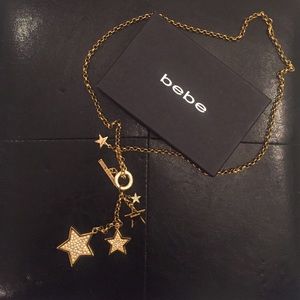 Bebe gold long chain star charm necklace