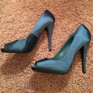 Anne Michelle teal satin stilettos.