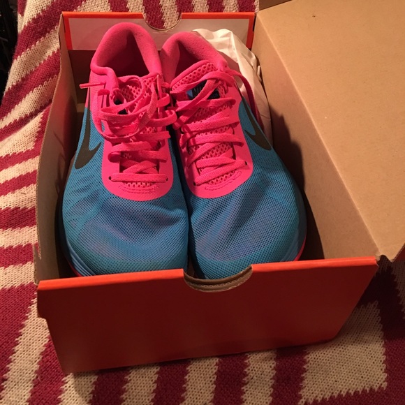 Blue and pink nike shoe