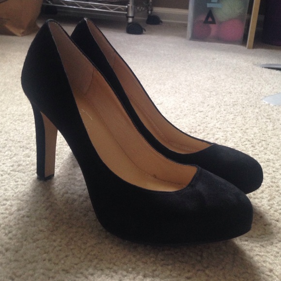 Black suede pumps