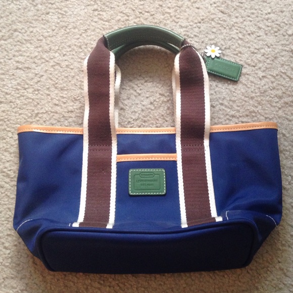 Blue daisy Coach hand bag.