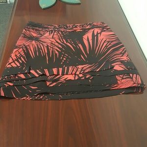 Coral and black skirt