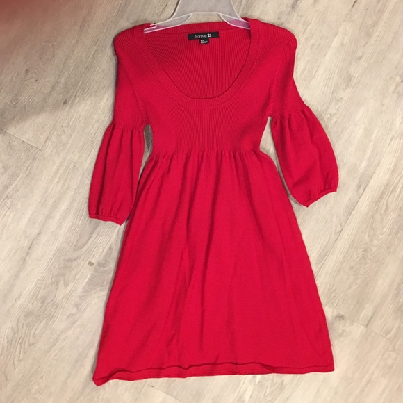 Red sweater dress and gold sheer dress