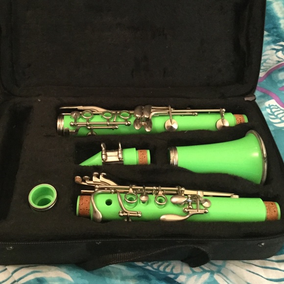 A green plastic clarinet