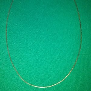 Costume jewelry- thin necklace and knot style ring
