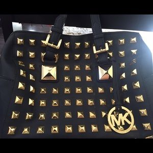 Gold studded, leather Michael Kors purse