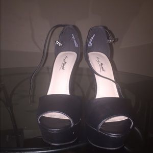 Black faux patent leather peep toe heels