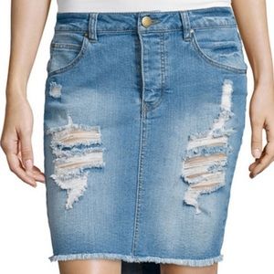 Denim skirt with rip.
