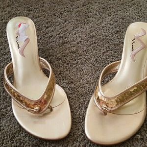 Gold kitten heel shoes