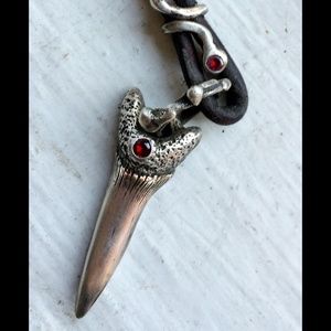 Silver shark tooth with ruby