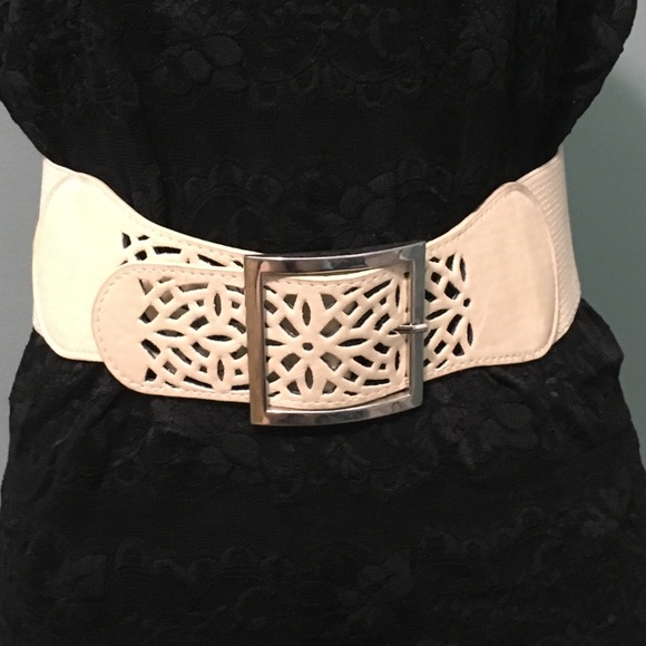 Cream stretchy cut out belt size M/L.