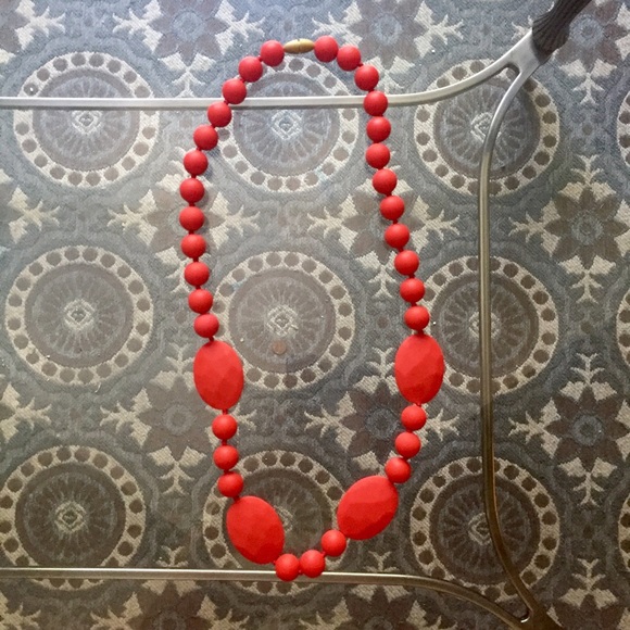 Bright red teething necklace