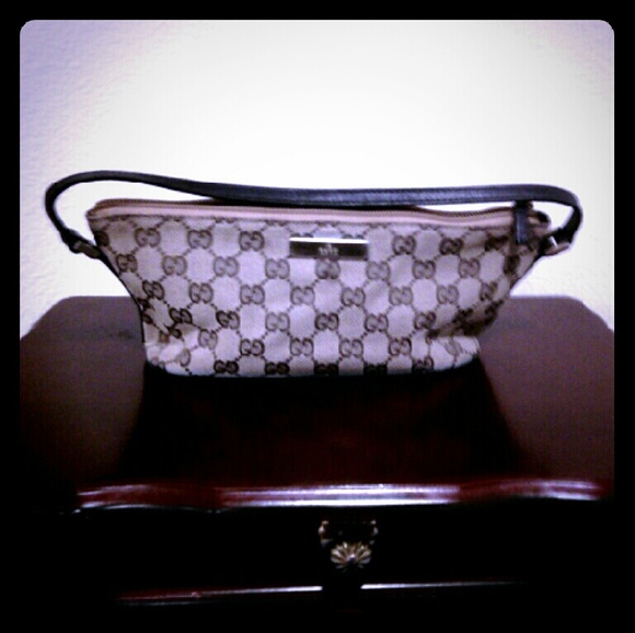 Authentic Gucci clutch/cosmetic bag