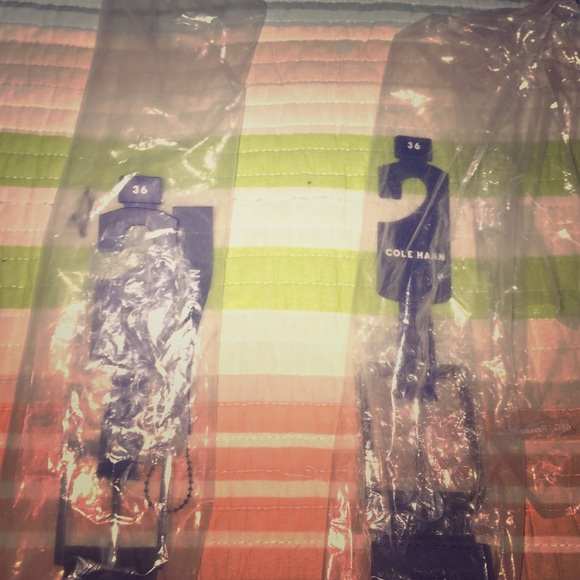 Cole Haan belts 1 black, 1 navy blue