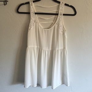 Off white flowy tank by Chloe K