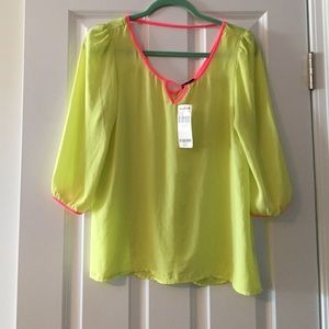 Yellow and neon pink blouse