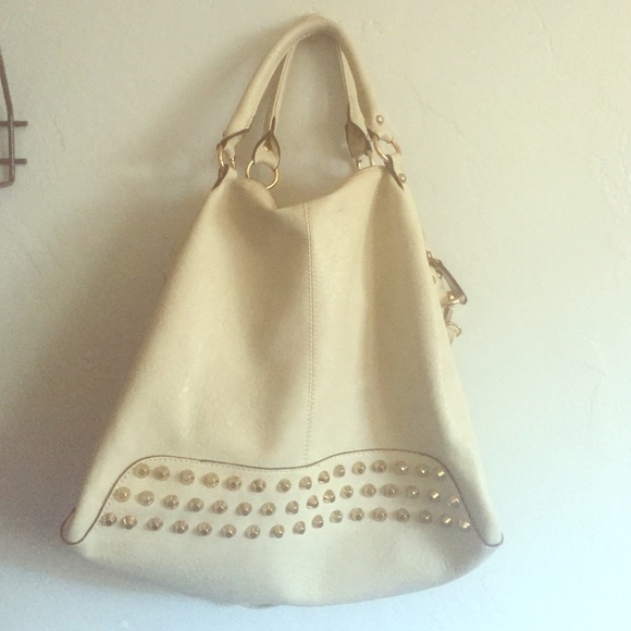 Cream colored studded bag